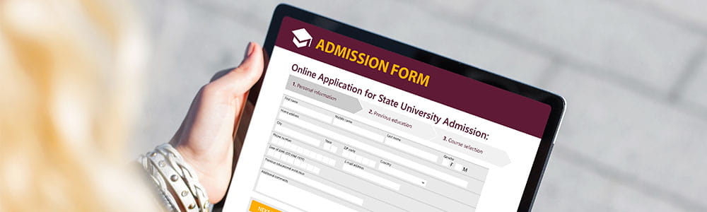 College Admission Form online on a tablet being read by a women