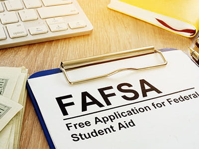Clipboard with FAFSA application on it