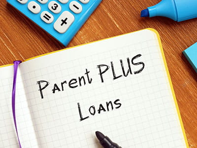 Notepad saying Parent PLUS Loans