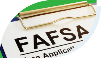 Clipboard with paper that says FAFSA Free application for federal student aid .