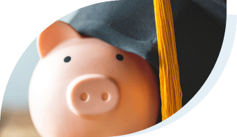 piggy bank wearing a graduation cap with cash it just received from federal student loans